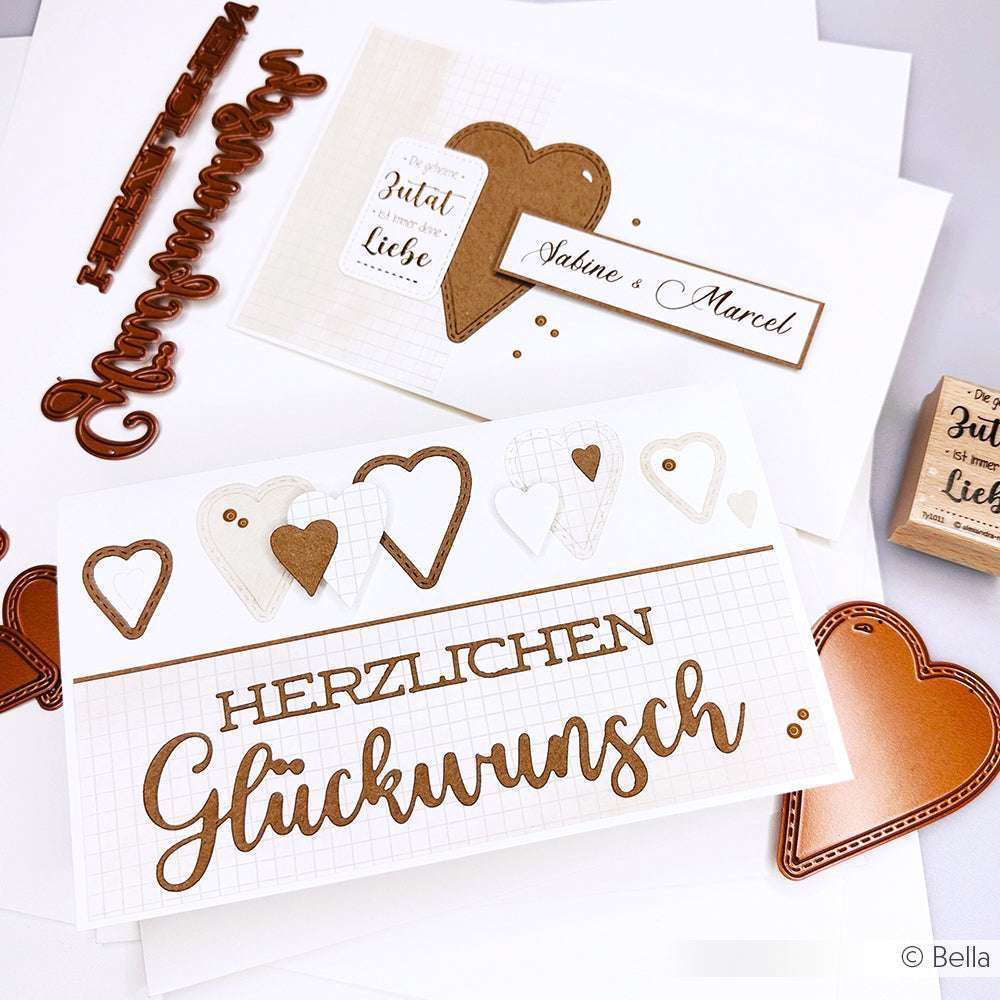 Die handgefertigten Karten von Alexandra Renke zeigen Herzen und den deutschen Gruß "Herzlichen Glückwunsch", verziert mit braunen Zierstempeln, Motivstanze und eleganten Stanzformen.