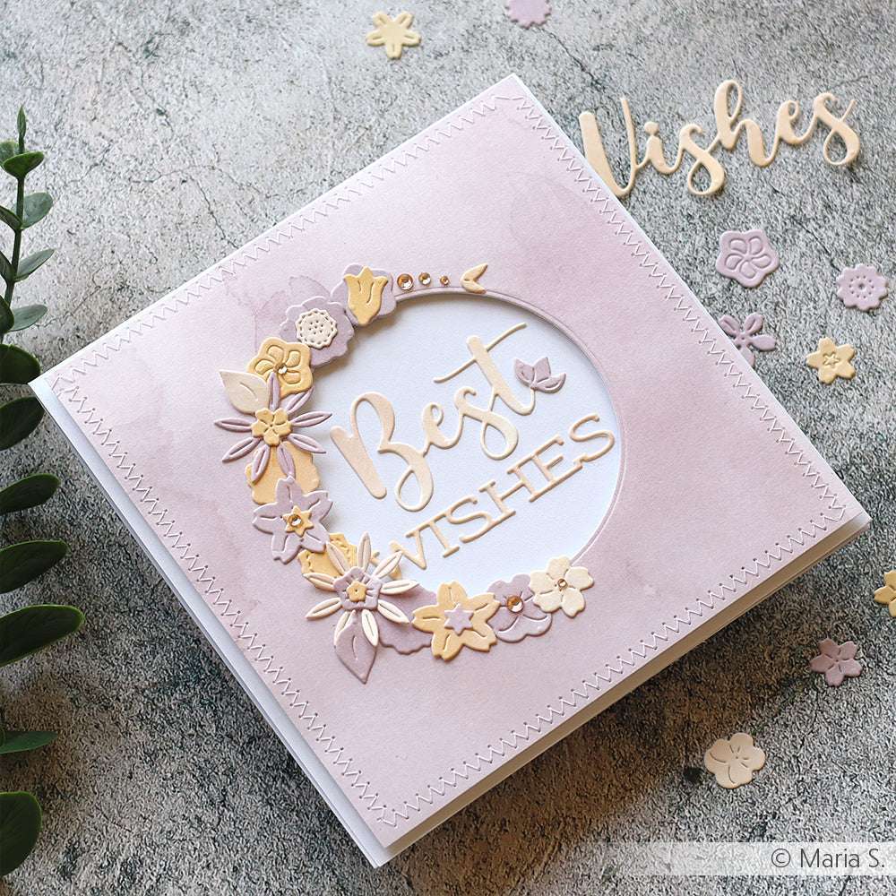 Quadratische Pastellkarte von Alexandra Renke mit Schriften-Duo "Beste Wünsche" und zarten Blumendekorationen, hergestellt mit DieCut Systemen, auf einer strukturierten Oberfläche.
