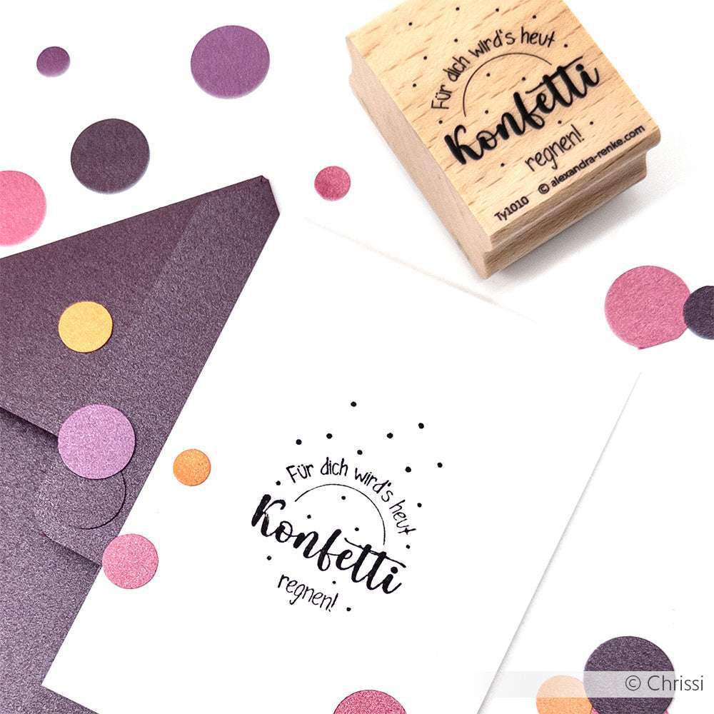 Ein festliches Briefmarken-, Karten- und Umschlag-Set von Alexandra Renke mit dem Text "Für dich wird's heut Konfetti regnen!" und buntem Konfetti - ideal für Papierprojekte oder kreative Holzstempel-Gestaltungen.