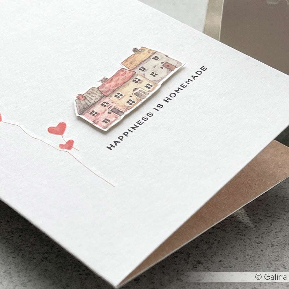 Alexandra Renke Grußkarte mit aquarellierten Häusern, roten Herzen und "HAPPINESS IS HOMEMADE" - ideal für Papierprojekte oder in Kombination mit Ihren Lieblings-Holzstempel-Motiven.