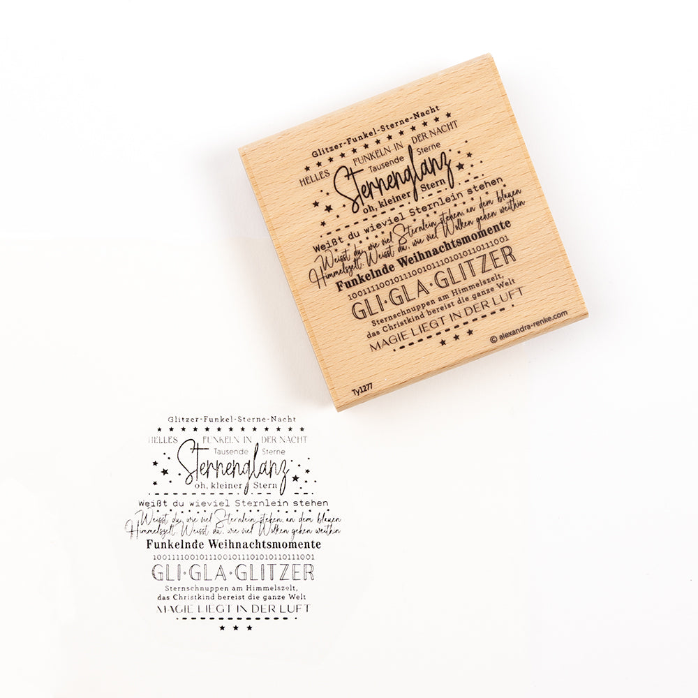Holzstempel mit einem Aufdruck, der einen deutschen Text über Sterne und festliche Momente enthält.