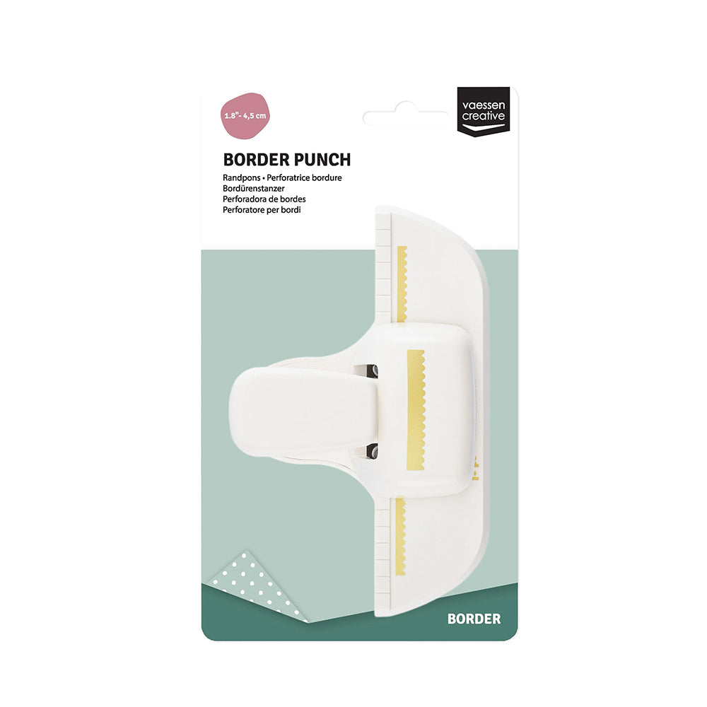 Die Vaessen-Creative Border Punch wird in einer Verpackung mit Linealführungen für Präzision geliefert. Ein Muster zeigt die elegante Zierkante, die dieses Bastelwerkzeug entlang der Papierkanten erzeugt.