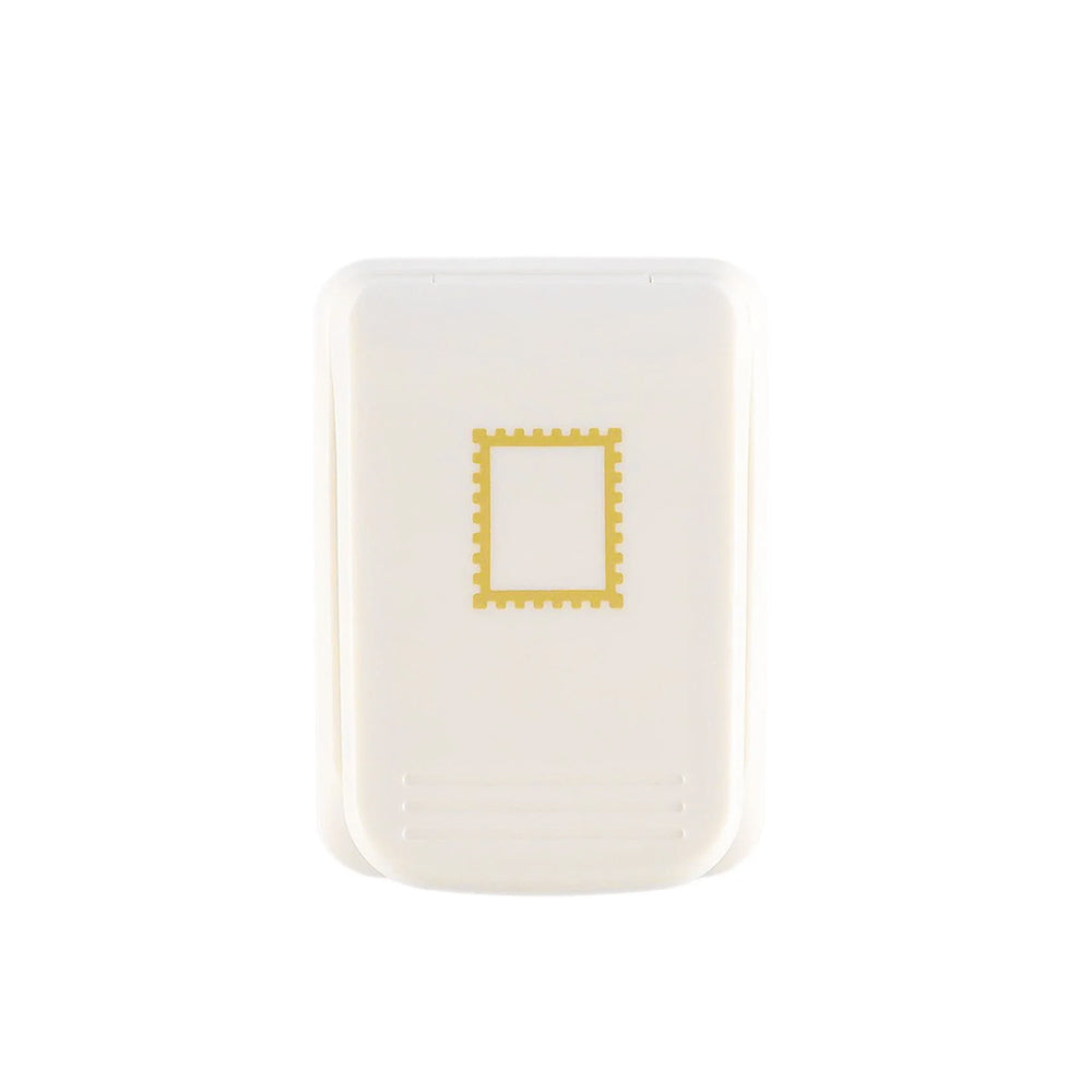 Ein weißes, rechteckiges Kunststoffgehäuse von Vaessen-Creative Motivstanzer zeigt auf der Vorderseite ein gelbes, stempelähnliches Motiv vor weißem Hintergrund.