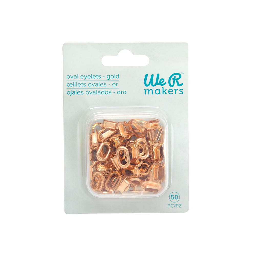 Eine Packung mit 50 goldenen Metallösen von Vaessen, ideal für Scrapbooking-Projekte, verpackt in einem durchsichtigen Kunststoffbehälter. Kompatibel mit dem ovalen Crop-A-Dile-Werkzeug.