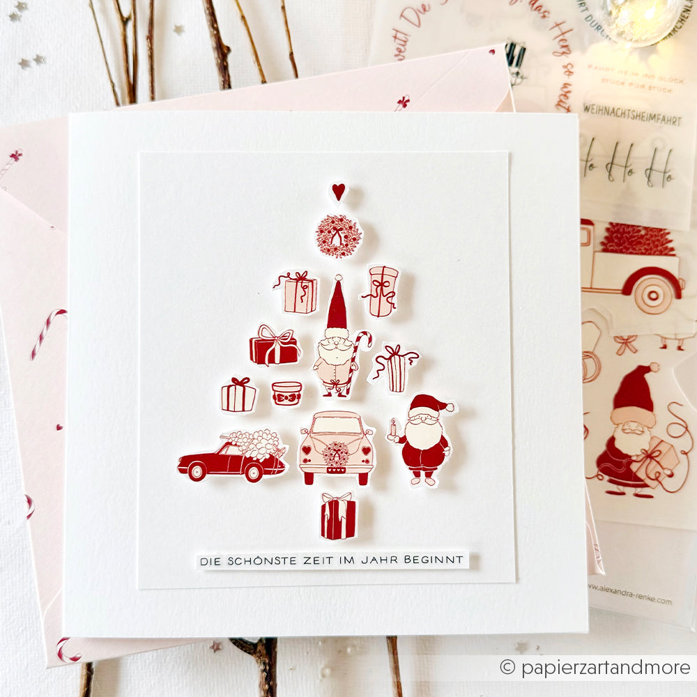 Handgefertigte Weihnachtskarte von Alexandra Renke mit roten und weißen Illustrationen in Baumform - ideal für Bastelprojekte oder um Ihre Weihnachtsgrüße mit Transferfolien festlich zu gestalten.
