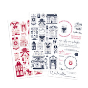 Drei Bögen von Alexandra Renke mit weihnachtlichen Haus-, Fenster-, Kranz- und Textmotiven in Rot, Marineblau und Schwarz - ideal für Bastelprojekte im Winter oder um Ihre Basteleien mit Rub-On Festlichkeiten im Winterheim-Stil zu ergänzen.