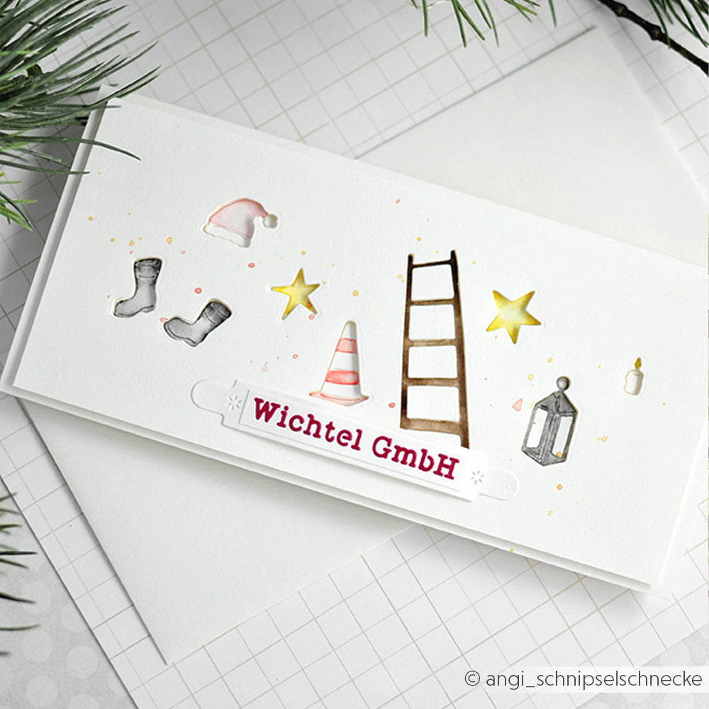 Eine festliche Karte von Alexandra Renke mit Leiter, Stern, Verkehrskegel, Hut, Stiefeln und Text auf Weiß - ideal, um mit Ihrer Motivstanze Wichtel oder Dies passende Designpapiere für besondere Anlässe zu gestalten.