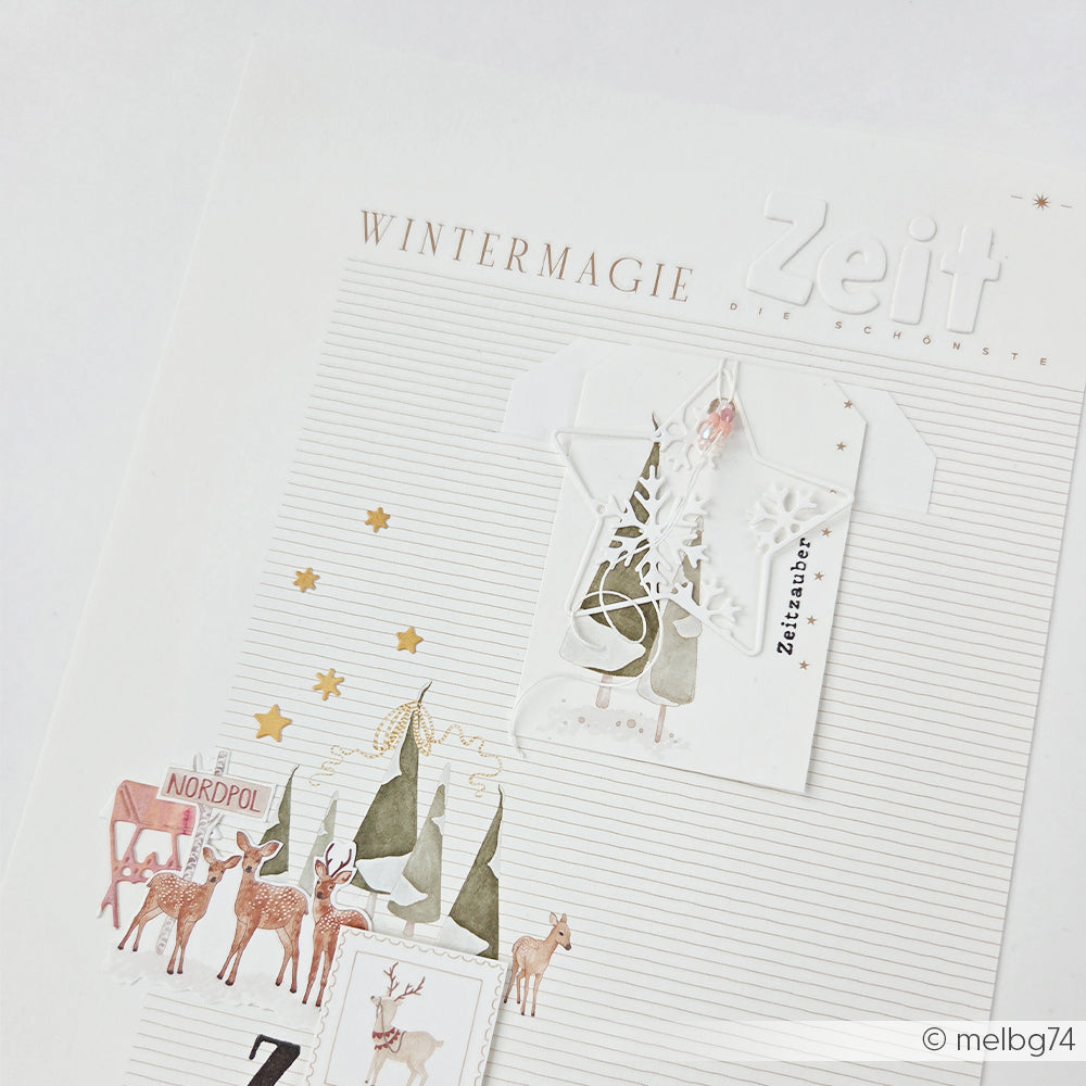 Dekorative Seite mit dem Schriftzug WINTERMAGIE, Rentieren, Bäumen und der Motivstanze Schneeflockenstern.