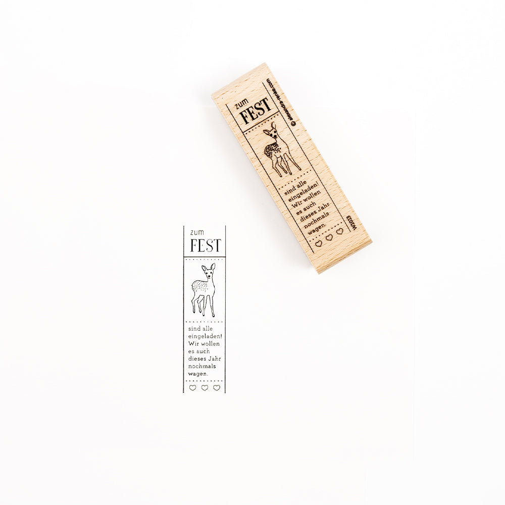 Ein rechteckiger Holzstempel mit hochwertigen Holzstempel-Motiven eines Hirsches und einem deutschen Text.
