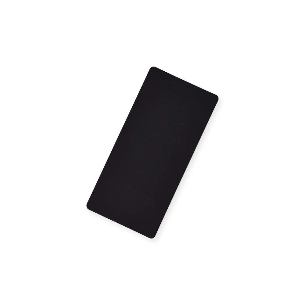 Eine schwarze rechteckige Vaessen Silikonmatte mit abgerundeten Ecken, perfekt für Ihre Cut Easy Mini Stanz- und Prägemaschine, abgebildet auf einem weißen Hintergrund.