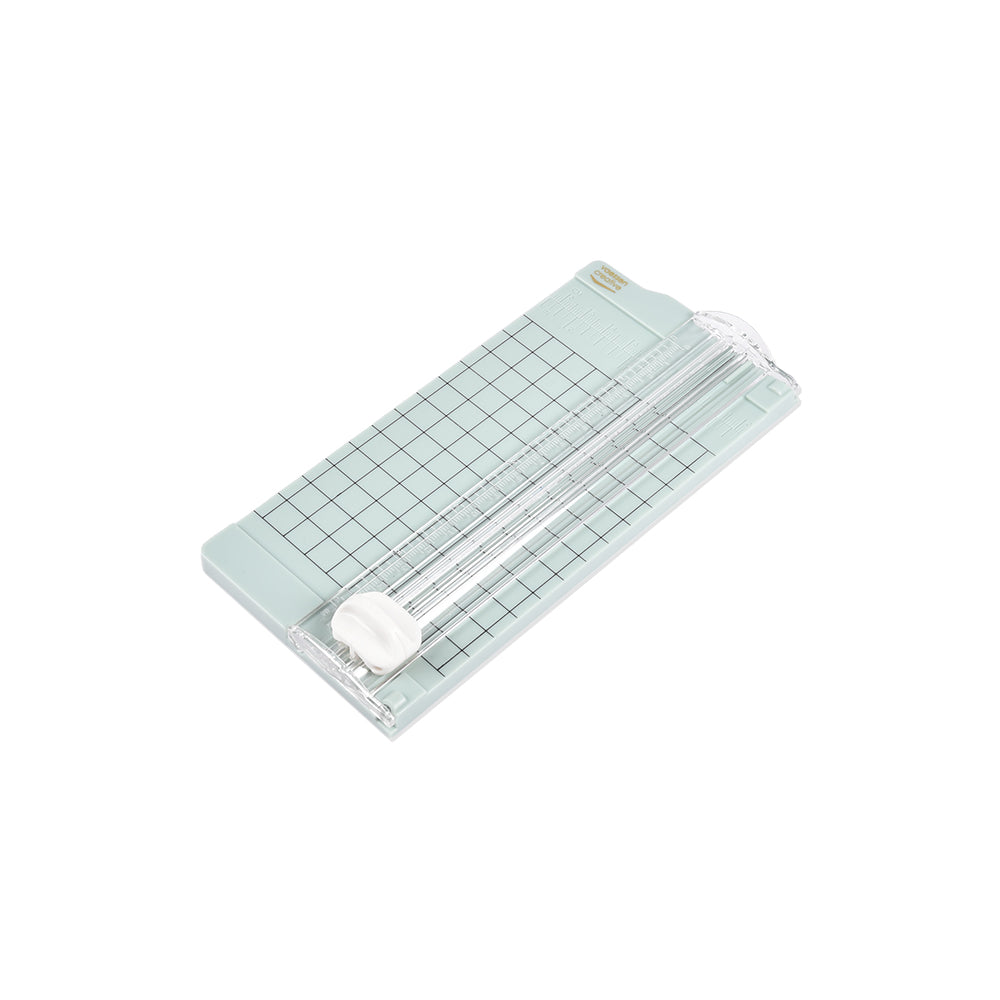 Der Vaessen Papierschneider hat ein Gitterdesign und eine verschiebbare Klinge auf einer rechteckigen Basis, ideal für präzise Papierprojekte. Ausgestellt auf weißem Hintergrund.